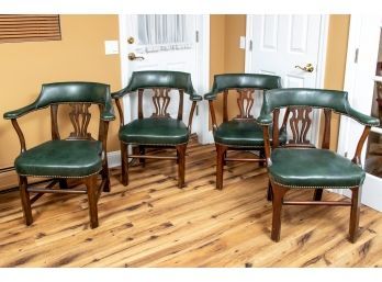 Four Vintage Green Leather Roundabout Chairs