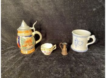 Stein, Cups And A Small Metal Pitcher