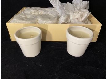 Six New In Package White Flower Pots With Candles In Them