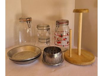 Kitchen Lot, Metal Pie Plates, Glass Canisters, Steamer Basket And A Wooden Paper Towel Holder