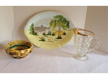 A Hand Painted Signed Platter W A Farm Scene, A Pottery Bowl And A Glass Water Pitcher