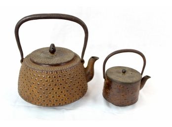Two Oriental Metal Teapots