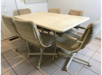MCM Laminate Table And Chairs On Casters