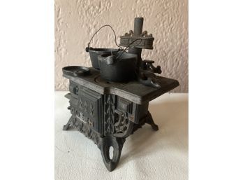 Small Cast Iron Queen Toy Stove With Pots Good To Go..