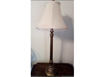 Brass Colored Candlestick Lamp With Beaded Lampshade And Fancy Finial