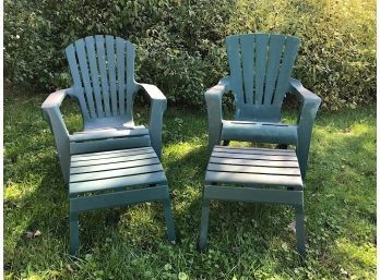 Two Resin Green Adirondack Chairs With Foot Rests