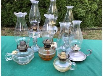 A Collection Of Hurricane Lamps
