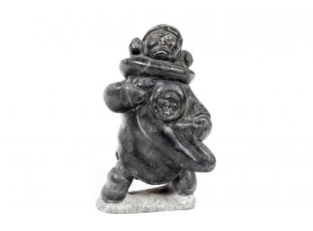 Inuit Soap Stone Carving Of Man Carrying Family