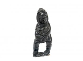 Inuit Art Soap Stone Craving Of Man Holding Fish Bundle