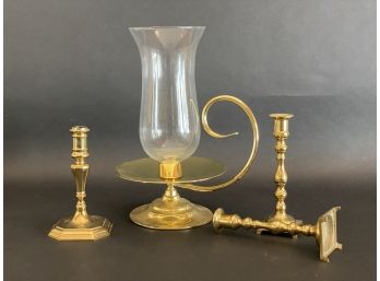 A Fabulous Brass Candle Holder With Hurricane & Three Brass Candlesticks
