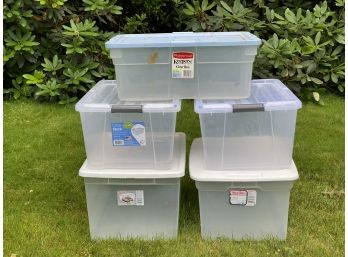 A Stack Of Assorted Storage Bins #3