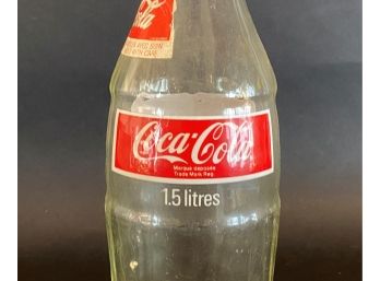 A Vintage 1.5L Glass Coca-Cola Bottle, English & French