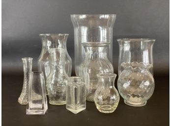 An Assortment Of Clear Glass Vases