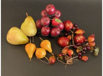 A Grouping Of Faux Fruit