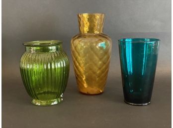A Grouping Of Three Colorful Vintage Glass Vases