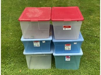 A Stack Of Assorted Storage Bins #7