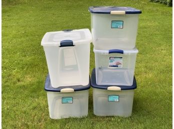 A Stack Of Assorted Storage Bins #5