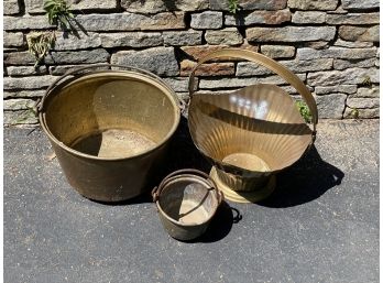 A Grouping Of Vintage Pots In Assorted Metals