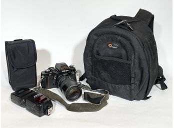 A Nikon Camera And Accessories