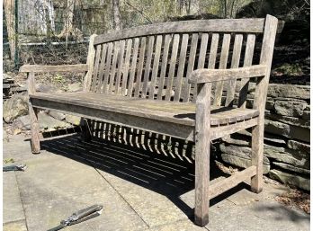 A Weathered Teak Garden Bench By Oxford Garden