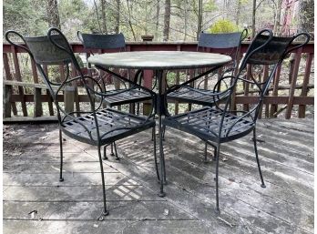 A Vintage Wrought Iron Dining Table And Set Of 4 Chairs