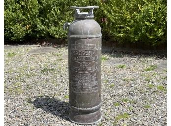 An Antique Copper Fire Extinguisher