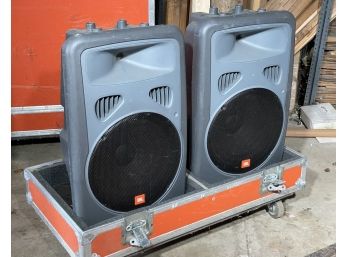 A Pair Of JBL Self Powered Speakers And Road Case