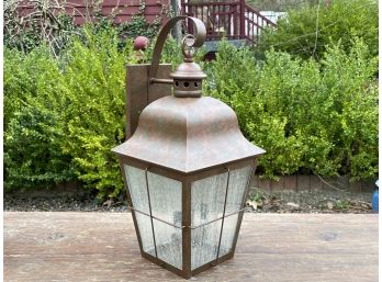 A Copper Lantern Sconce By Sea Gull Lighting