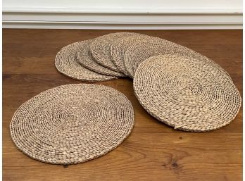 A Set Of 7 Woven Place Mats