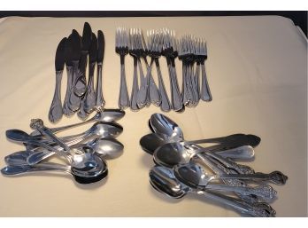 Gibson Stainless Steel Flatware.     -                  -                 Loc: Brown Box Under Sink