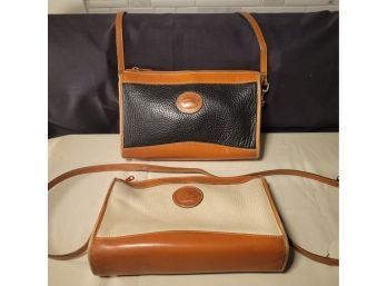 Dooney And Bourke Pocketbook Pair.              -                -            Loc: Right Of Fridge