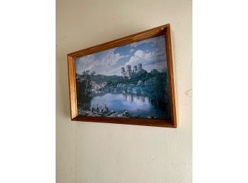 Framed Art Of A Tower In The Woods With People By The Lake