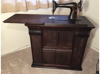 Antique 1920's  Foot Treadle Powered Singer Sewing Machine With A Beautiful Five Drawer Hardwood Parlor Cabinet(Click On Photo For Full Description And More Photos)