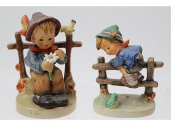 Two Hummel Figurines 'Retreat To Safety' And 'She Loves Me, She Loves Me Not!'