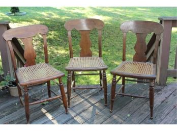 Three Vintage Wooden Chairs With Cane Seat