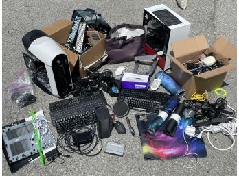 A Large Assortment Of Computer Parts, Pieces, Hard Drives, And Components