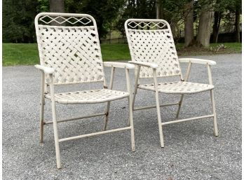 A Pair Of Metal And Acrylic Mesh Outdoor Chairs