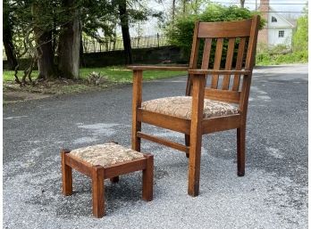 An Antique Oak Arm Chair And Ottoman After Stickley