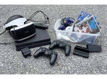 A Sony PS4 And Accessories