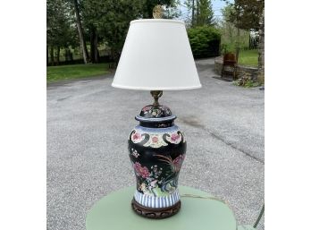 An Asian Ceramic Lamp On Rosewood Base