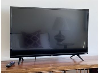 A TCL 24' Flat Screen Roku TV
