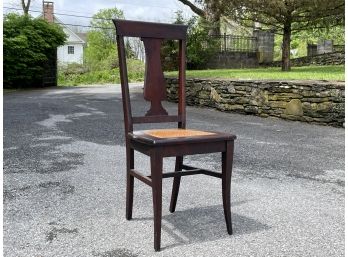 A Queen Anne Side Chair With Cane Seat