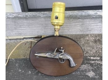 Vintage Wall Sconce With Flintlock Pistol Design On Wooden Back