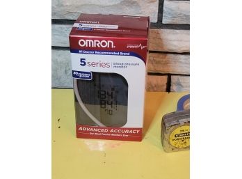Omron 5 Series Blood Pressure Monitor In Box                         Loc: Shelf 1