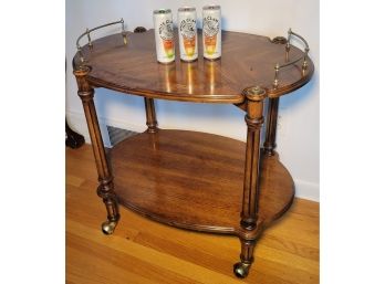 Mid Century Modern Beverage Cart On Casters.    Rolls Well And Had Nice Detail.           Loc: Living Room