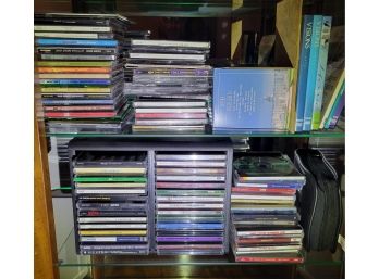 CD's All Of Them.                                  -                           Loc: In The Curio Front Room