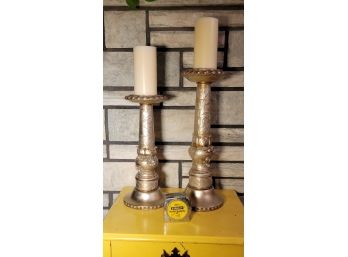 Silver Candle Pedestals And Candles.  The Pair              Loc: Nanna's Closet Floor