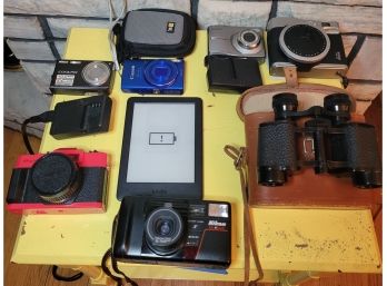 Camera And Binocular Group                              Loc: Shelf 2