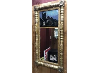 Rectangular Gold Tone Mirror With Reverse Painting Of Moonlit Buildings