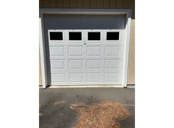 A Garage Door With Electric Opener - Door #2